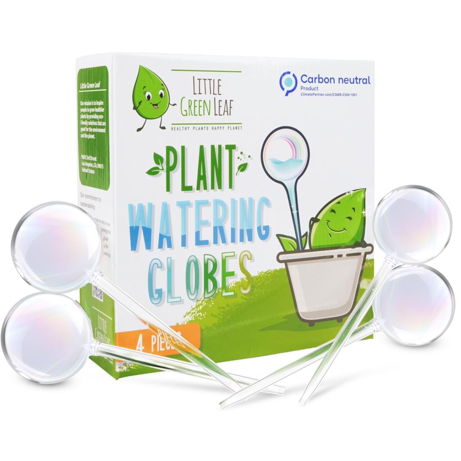 Little Green Leaf watering globes with clear glass bulbs on a plant for easy indoor hydration
