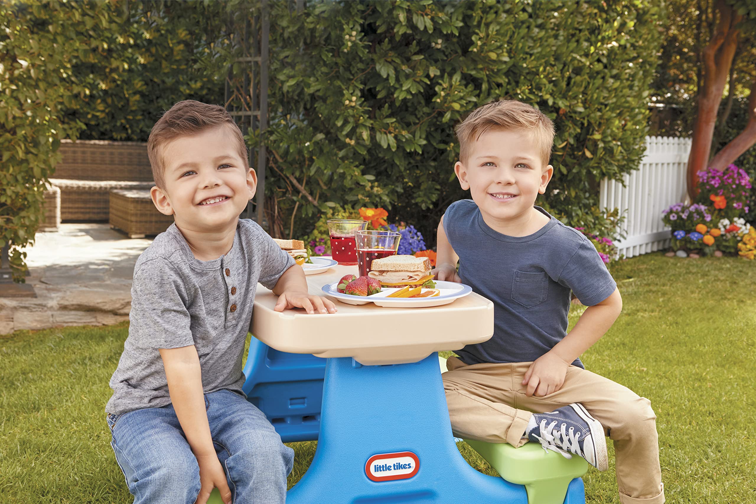 Little Tikes Easy Store Picnic Table folds for compact storage and portable use.
