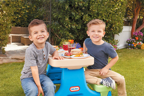 Little Tikes Easy Store Picnic Table folds for compact storage and portable use.