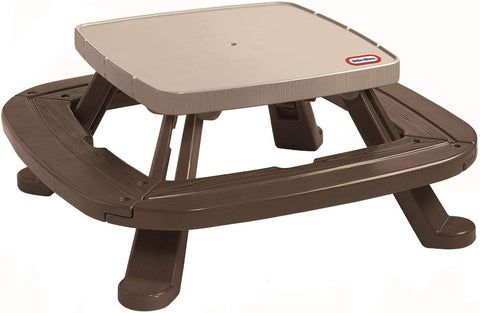 Little Tikes foldable picnic table shown folded for easy storage and transport