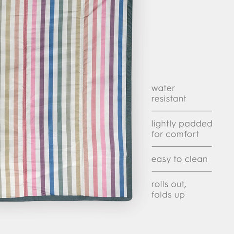 Little Unicorn blanket exterior zip-pocket for securing essentials on the go.
