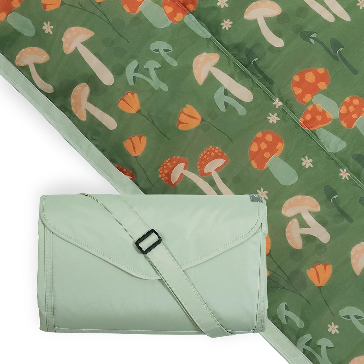 Little Unicorn XL picnic blanket open on sunny beach scene for family comfort
