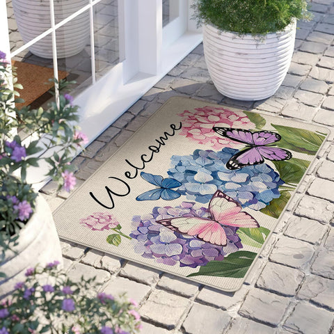 Livcoz floral butterfly doormat adds color and texture for indoor or outdoor use
