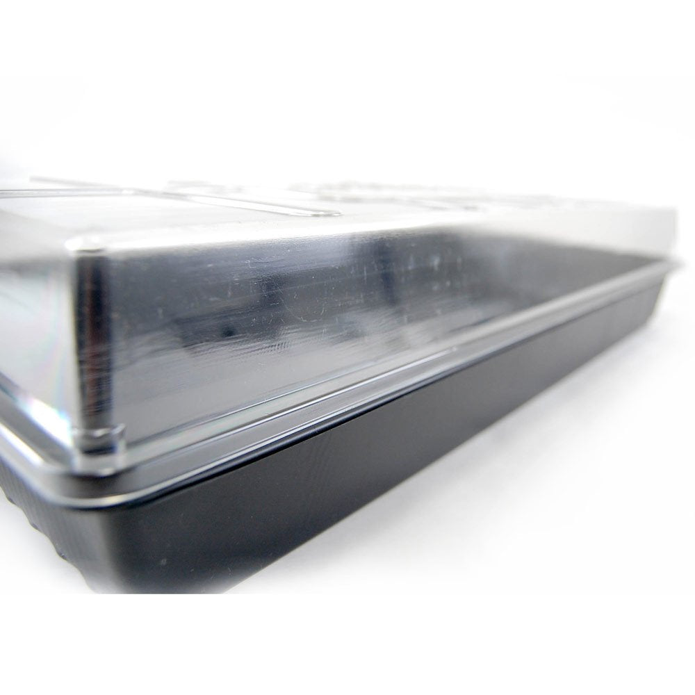 Living Whole Foods reusable dome helps stabilize humidity for herbs and microgreens.