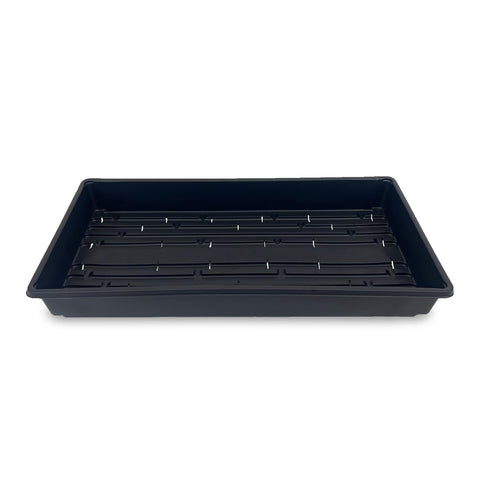 Living Whole Foods plant trays with drain holes ideal for seed starting and hydroponic setups.