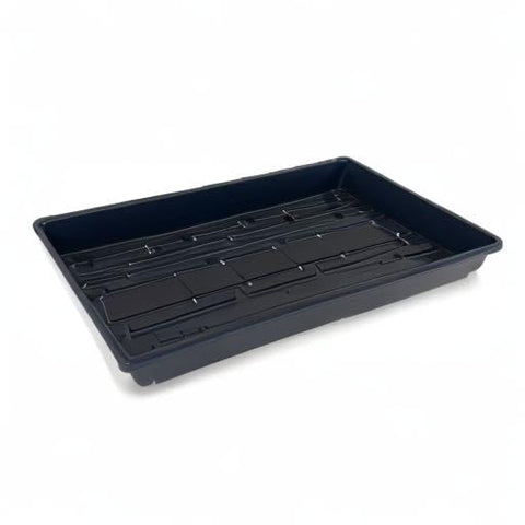 Living Whole Foods stackable trays to organize a multi-crop indoor garden.
