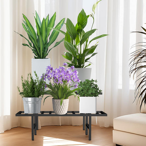 LLAXERGU two-tier plant rack elevates flower display in outdoor and indoor spaces.