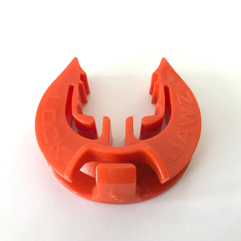 LockJawz orange insulator packaged for quick fence-line setup.