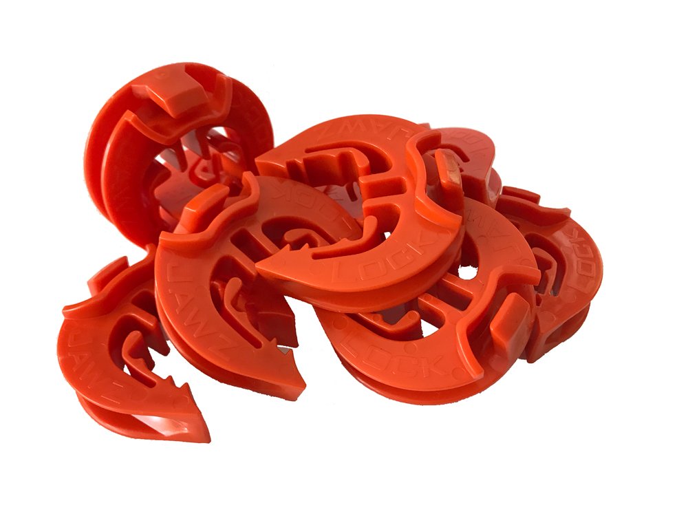 LockJawz orange insulator on post improves line visibility for inspections.