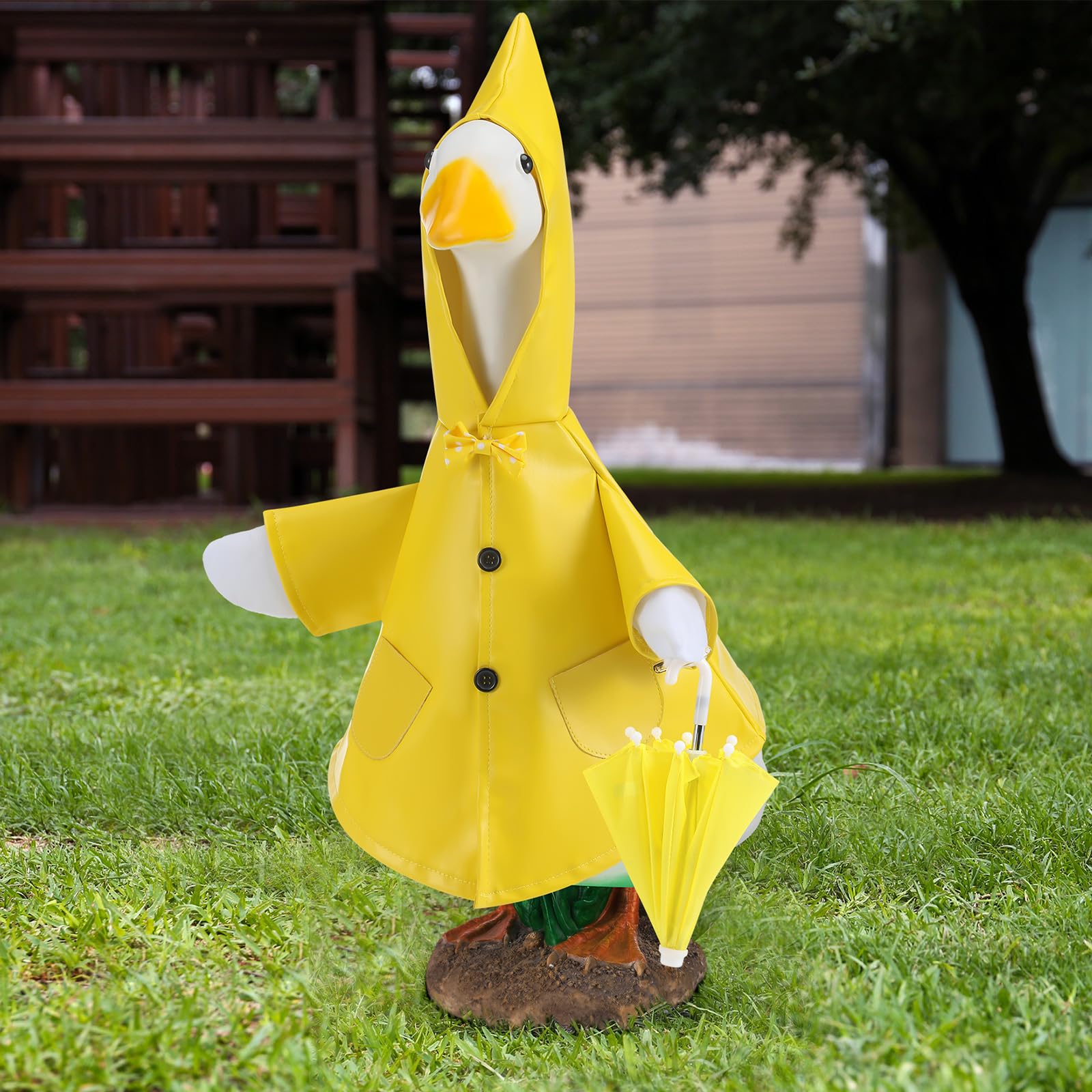 Locmeo porch goose outfit on statue creates a playful yard scene.