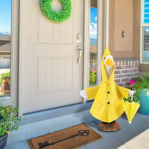 Locmeo yellow raincoat with bow enhances garden decor.