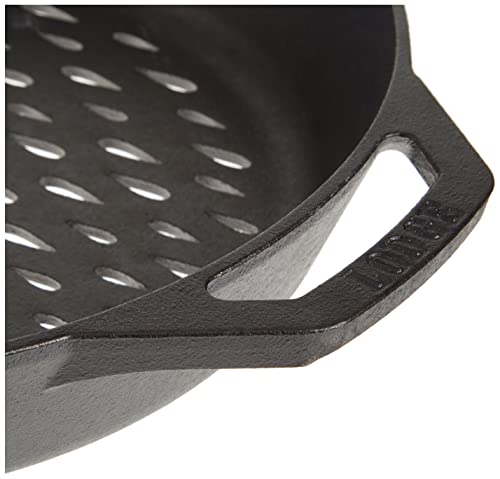 Lodge pan offers strong heat retention for even searing.
