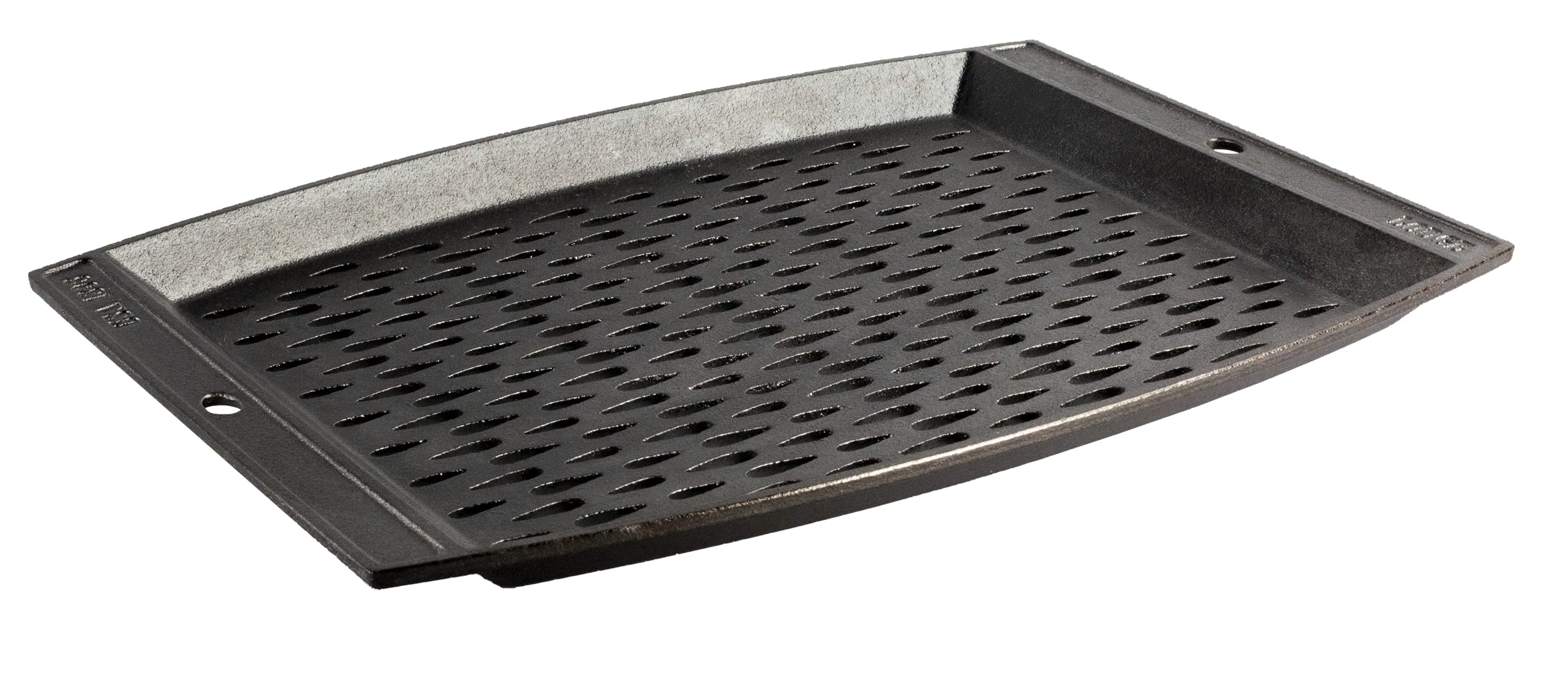 Lodge pre-seasoned grill topper on rectangle surface preserves food while grilling.