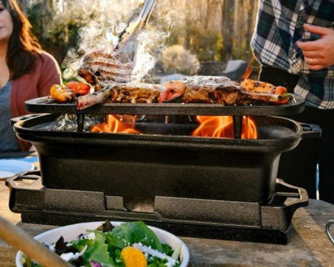 Lodge Sportsman's Pro Grill with removable grate for easy cleanup.