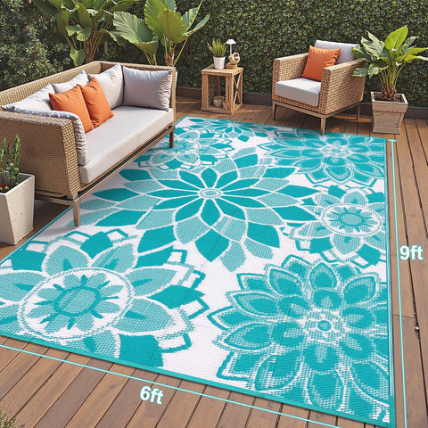LOKHOM reversible teal and white rug adds versatile styling for outdoor spaces