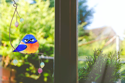 Lolitarcrafts bird themed decor uses natural light to lift mood