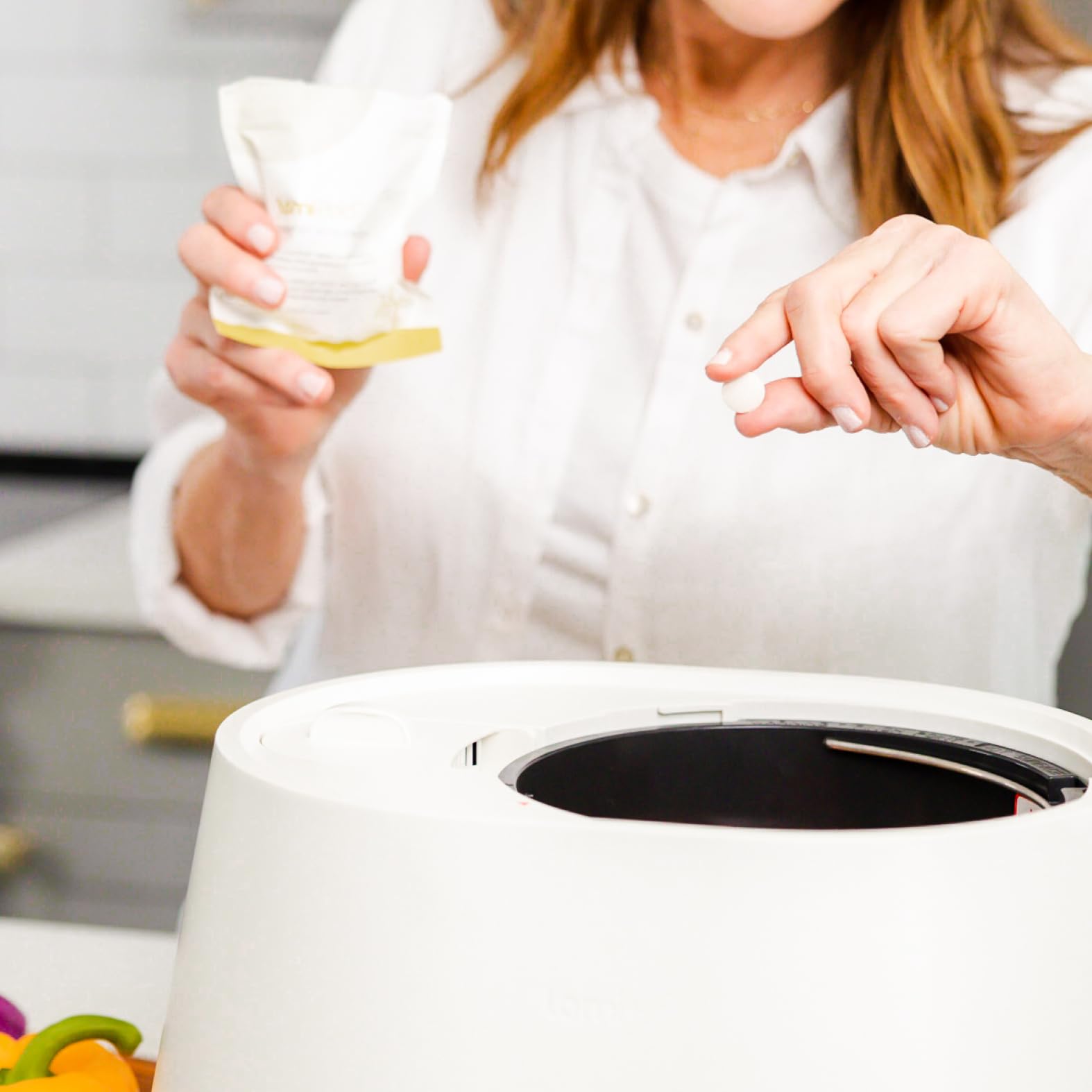 Kitchen scene showing fresh scent after using Lomi pods.