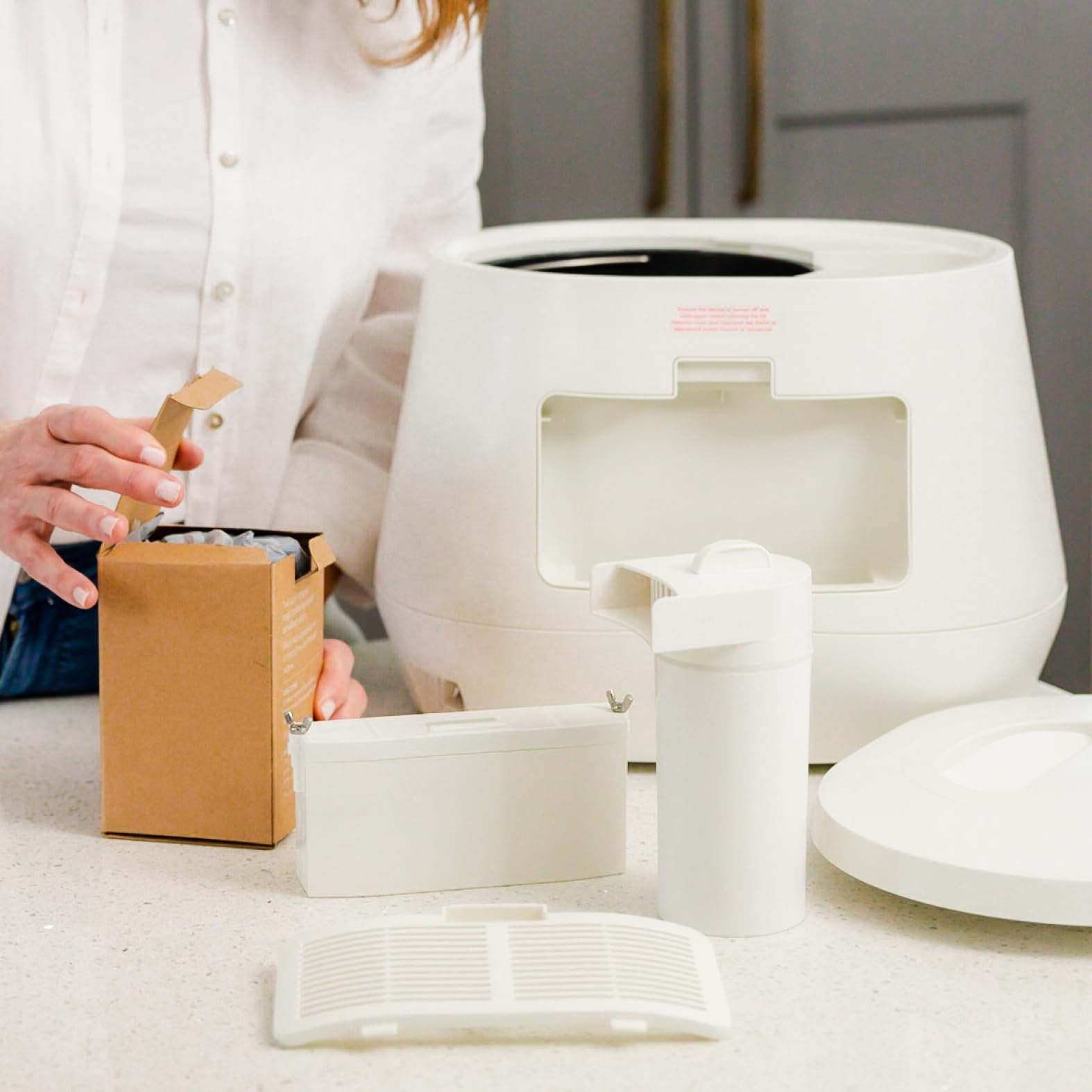 Close-up of Lomi pods installed for easy kitchen use.