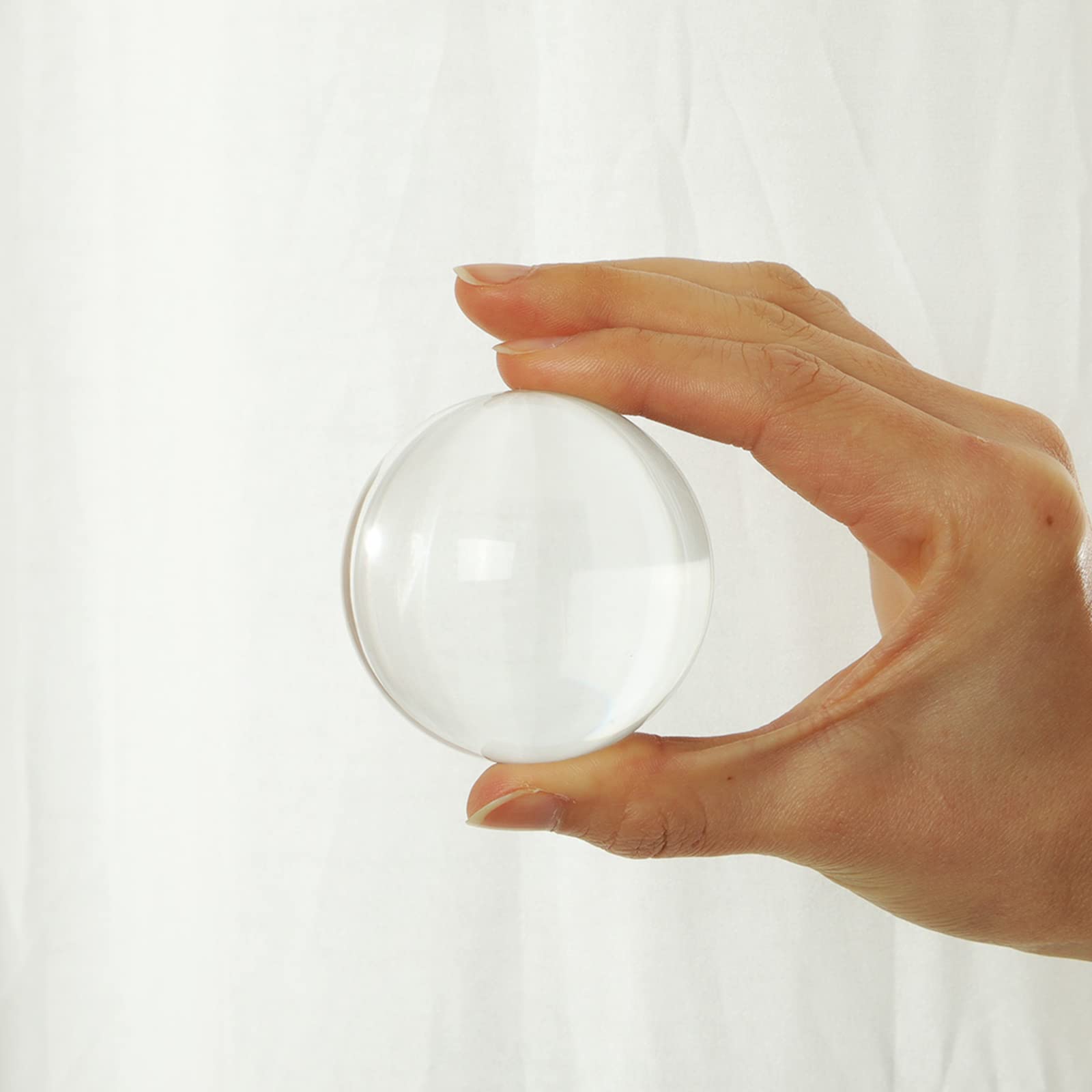LONGWIN crystal ball as photography prop with shadow play