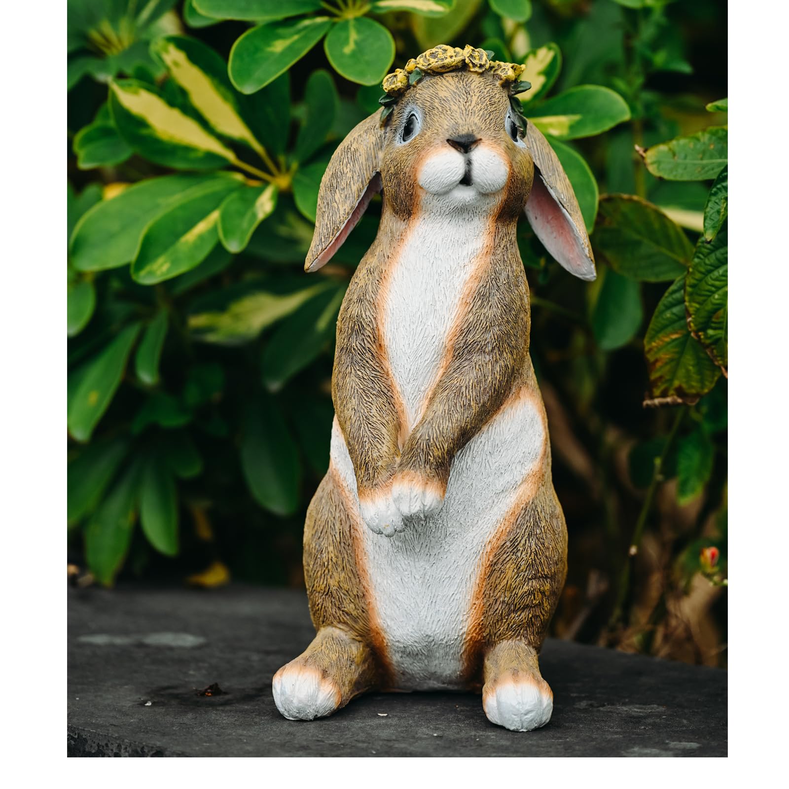Lonyin Deco bunny garden statue perched beside stepping stones for garden charm