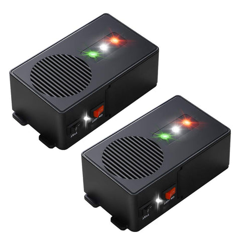 Loraffe ultrasonic rodent deterrent under hood with LED strobe deters mice in engines.