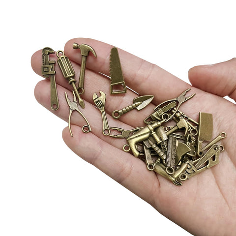 Loutas Bowdee bronze mini tools with intricate detailing boost DIY flair.