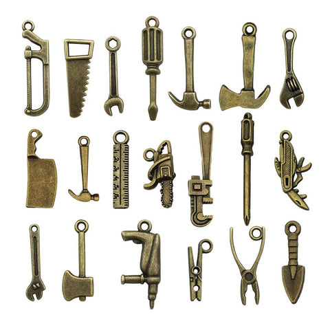 Loutas Bowdee bronze mini screwdrivers and wrenches enhance tiny project realism.