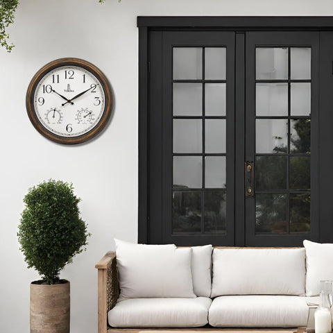 Lovely Home Essentials outdoor clock shows temperature with a readable thermometer.