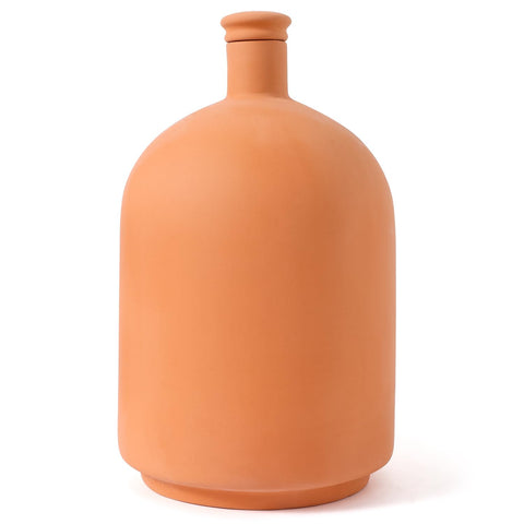 Lovely Ran large terracotta watering pot blends with decor while hydrating plants