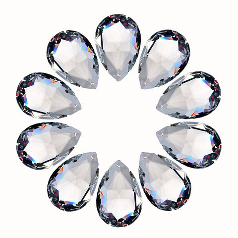 LoveUnited teardrop crystal pendant hanging in a window to create rainbow light