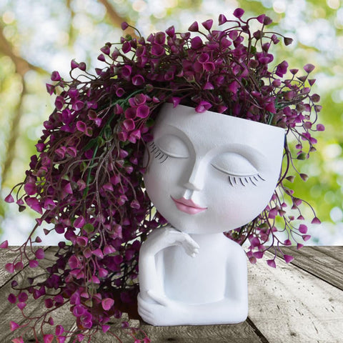 LovTocTic head planter compact design with drainage hole promotes healthy roots.