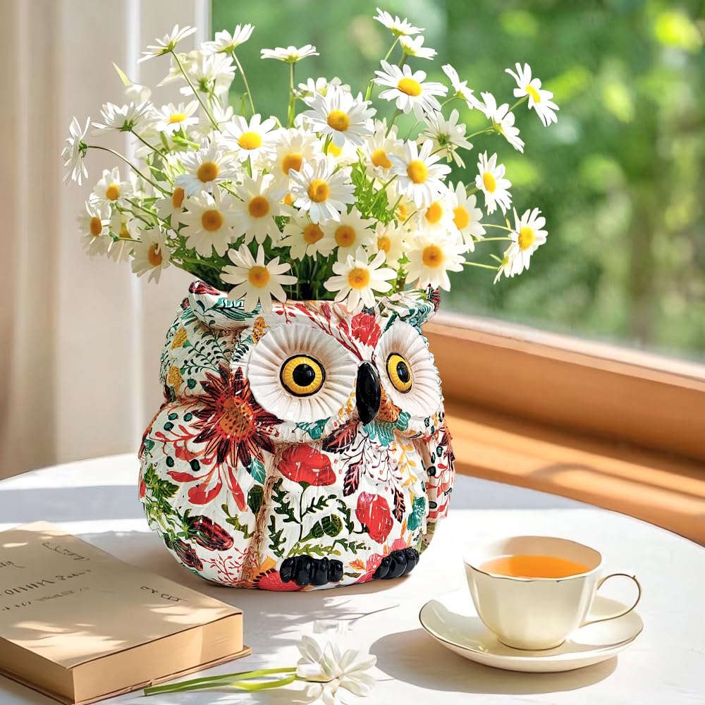 LovTocTic Owl Planter placed on an outdoor patio with small succulents.