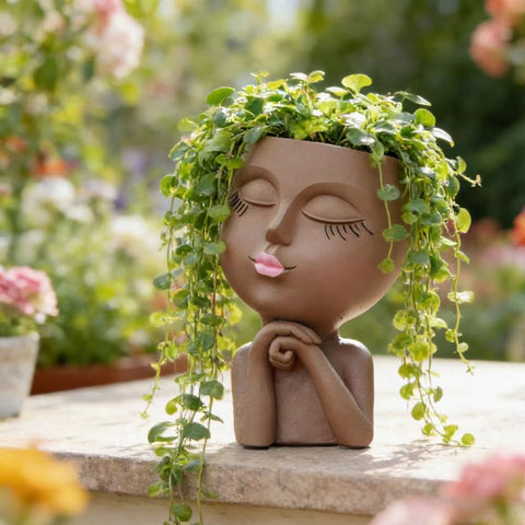 LovTocTic Succulent display idea with a charming head-shaped planter