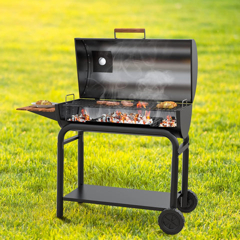 LS'BABQ ash pan installed and in use under a charcoal grate