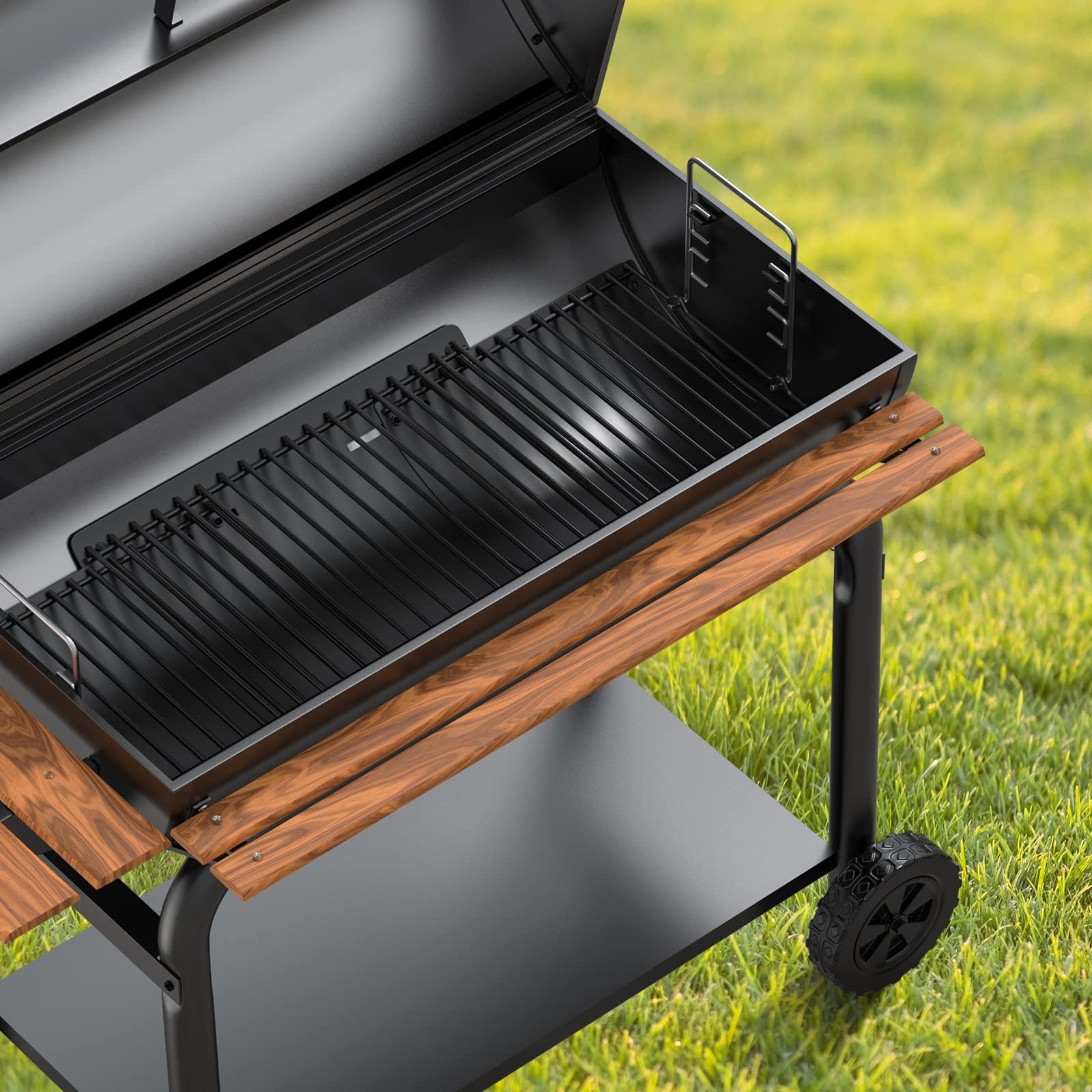 LS'BABQ ash pan being prepared for installation on a charcoal grill