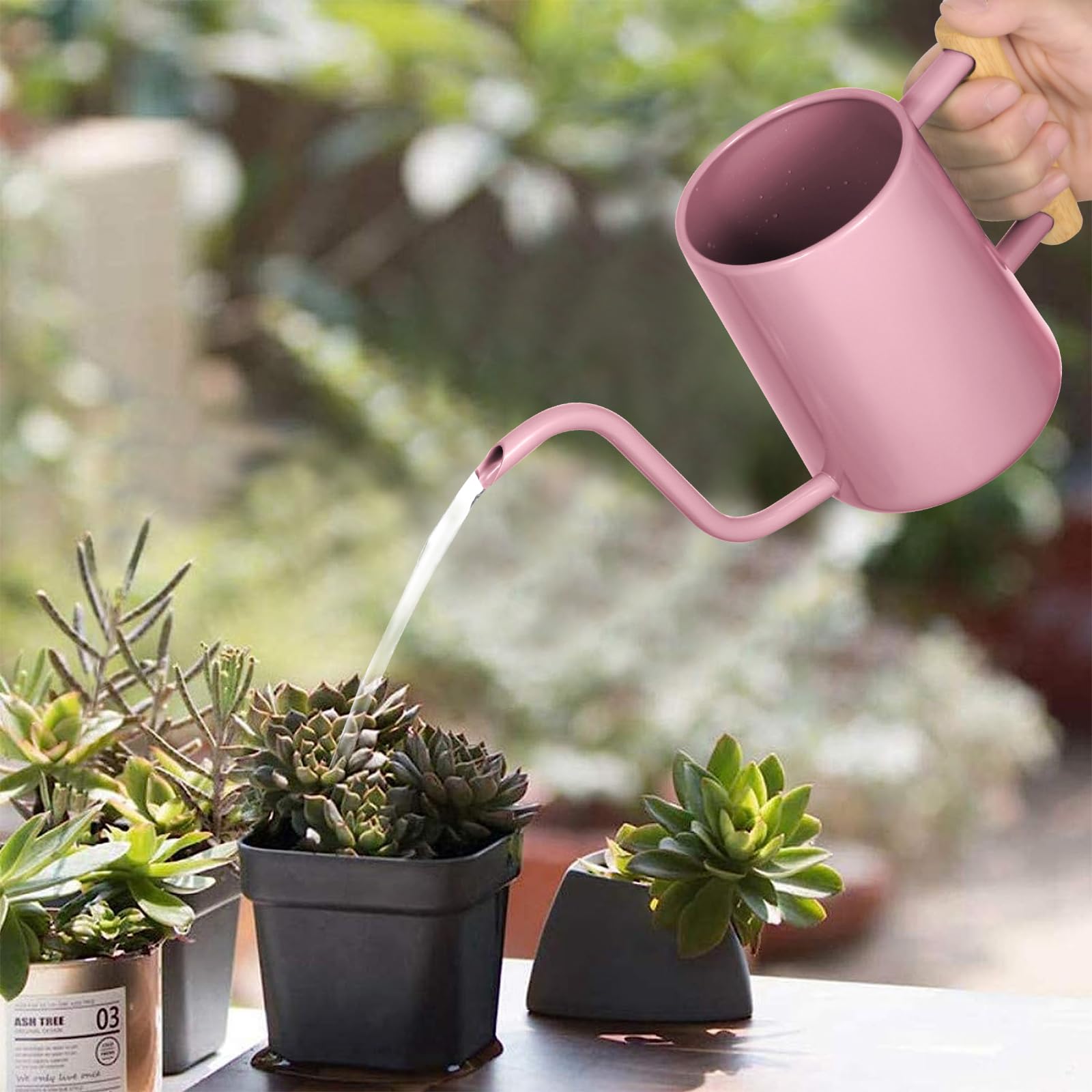 LTSUMI pink wooden-handle watering can with a comfortable grip