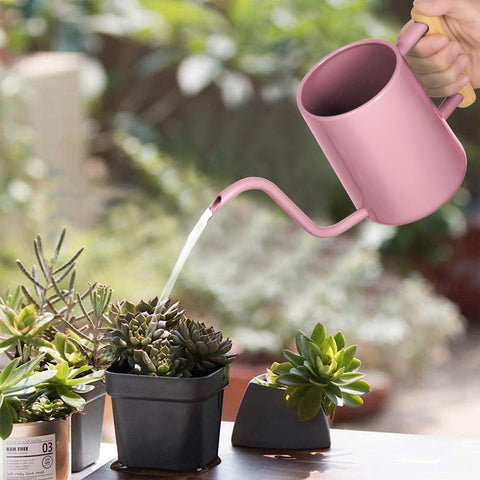 LTSUMI pink wooden-handle watering can with a comfortable grip