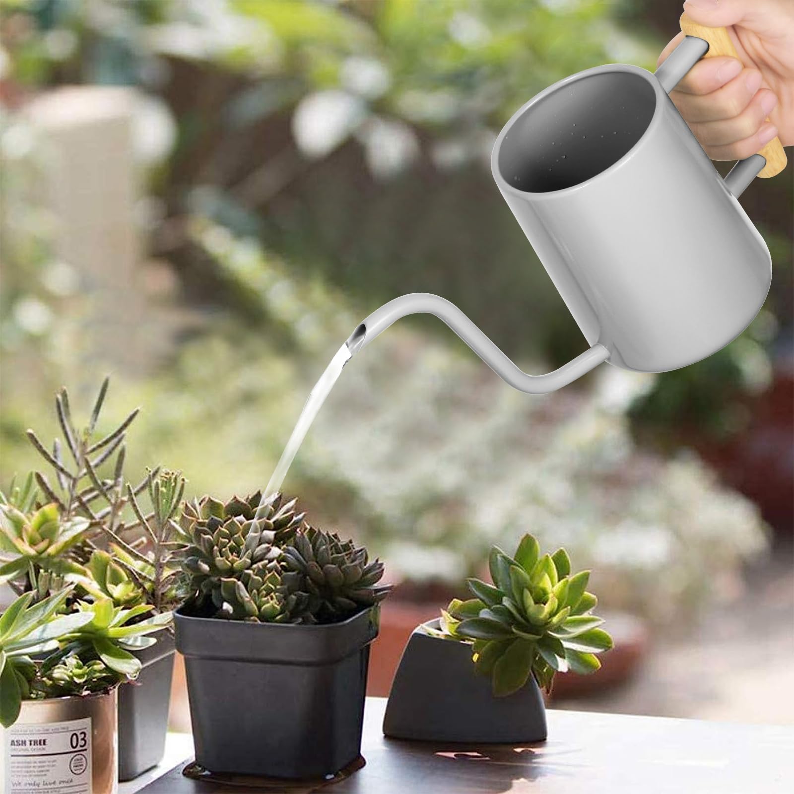 LTSUMI wooden-handled watering can providing a comfortable grip during use.