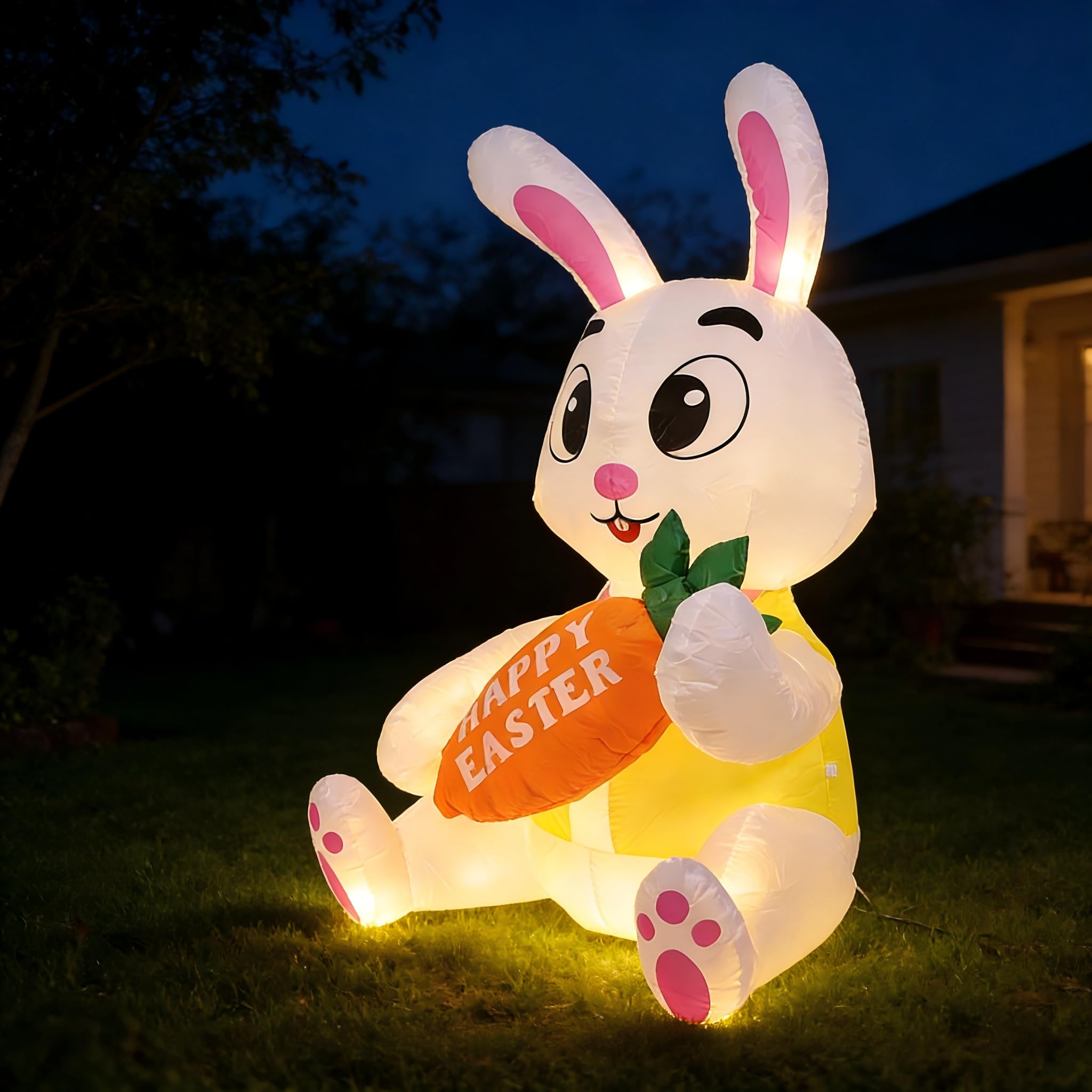 Luaeirus bunny with carrot LED lights brightening an outdoor Easter display.