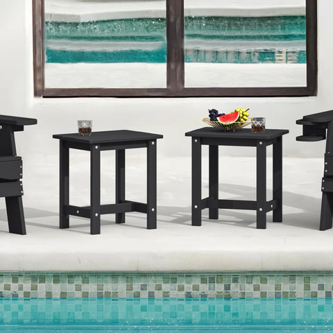 LUE BONA HDPS Adirondack end table beside a chair, durable and weather-ready.
