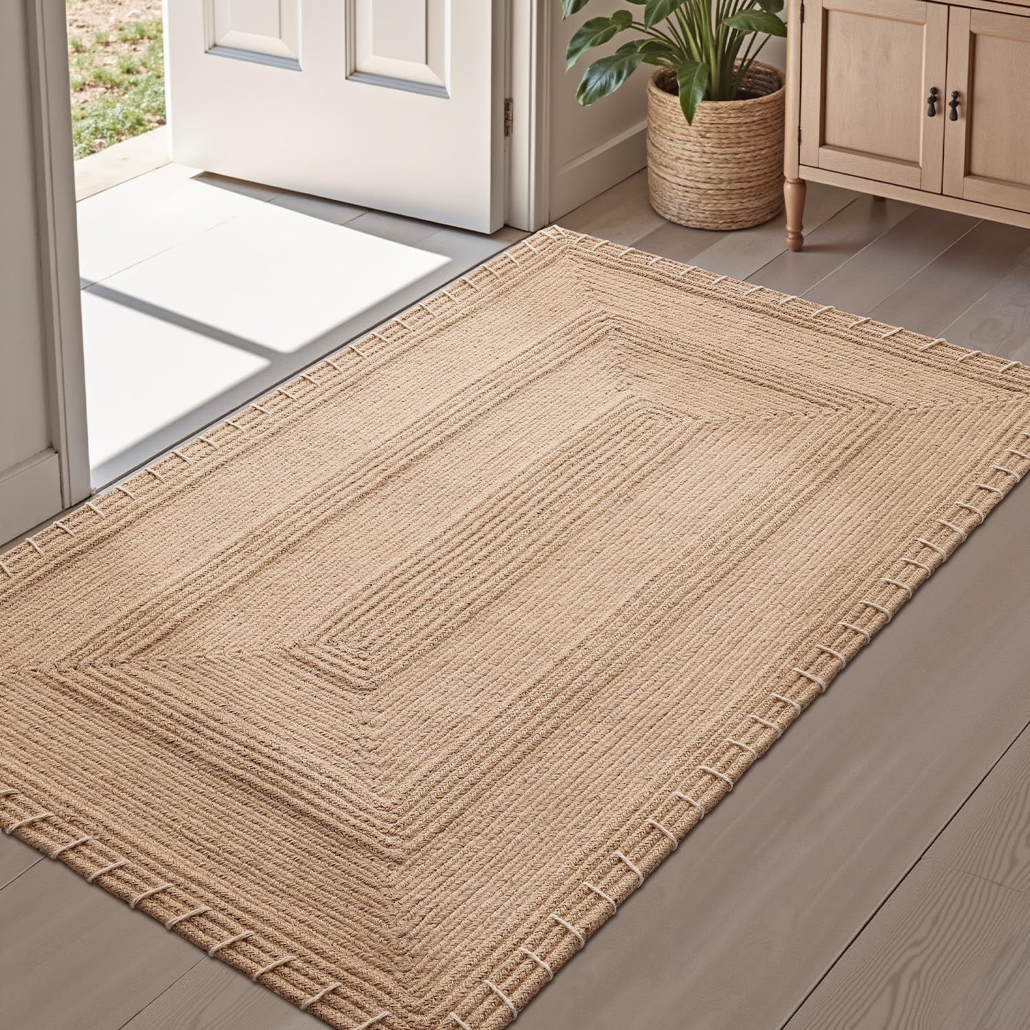 LUMI handwoven jute door mat at the front door; keeps floors dry and welcoming.