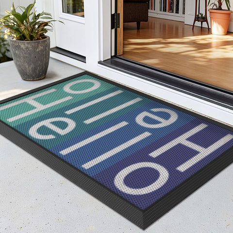LUMI Outside Welcome Door Mat close-up of textured surface traps dirt effectively