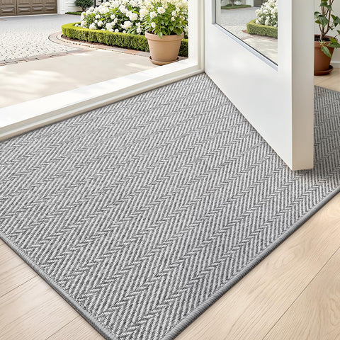 LUMI ultra-thin door mat at the entrance with a sleek, compact profile.