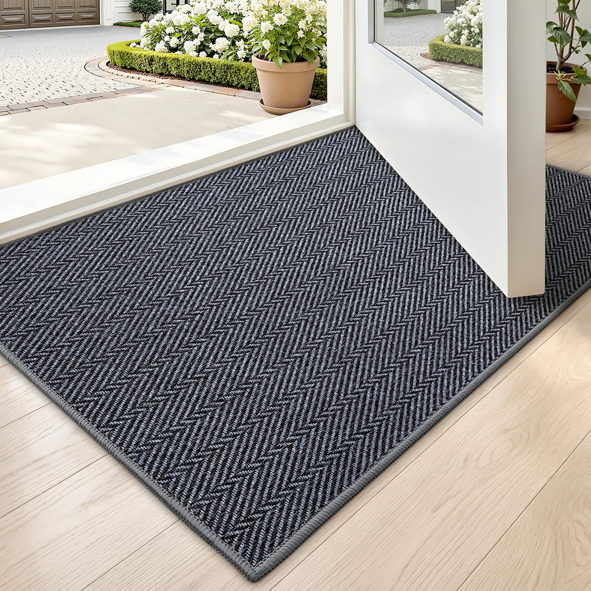 LUMI Ultra Thin Door Mat at the entrance with a low-profile design that traps dirt.