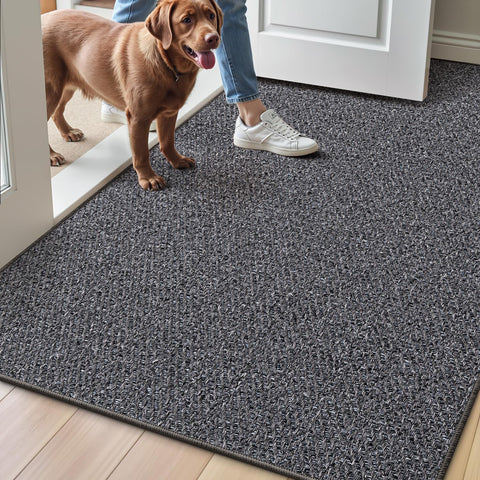 LUMI ultra-thin door mat at entrance showing secure non-slip backing.