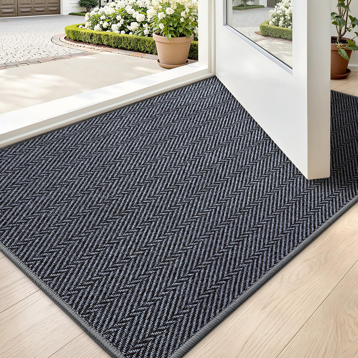 LUMI ultra-thin entrance mat with herringbone texture for a clutter-free entry.