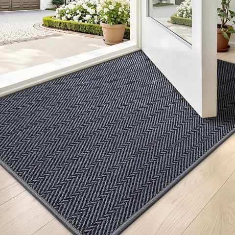 LUMI ultra-thin entrance mat with herringbone texture for a clutter-free entry.