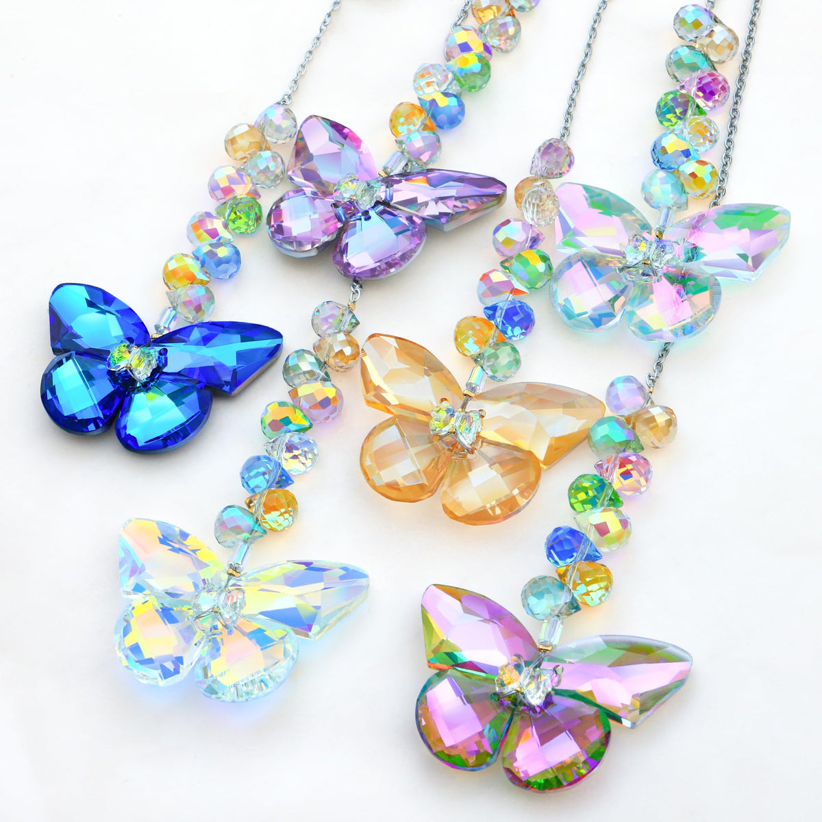 Lumiti crystal butterfly suncatchers create vibrant rainbows in windows and gardens.
