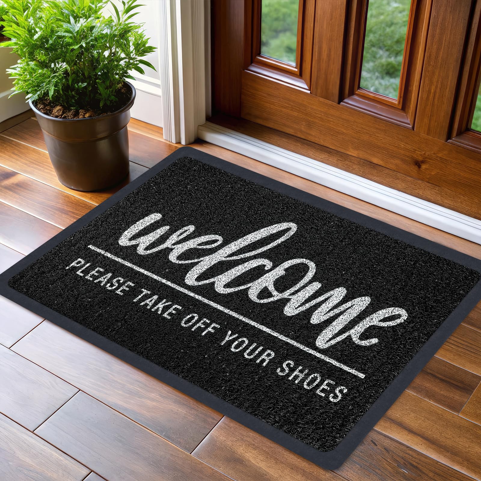 LUUFILx welcome door mat at the front entrance with a playful message.