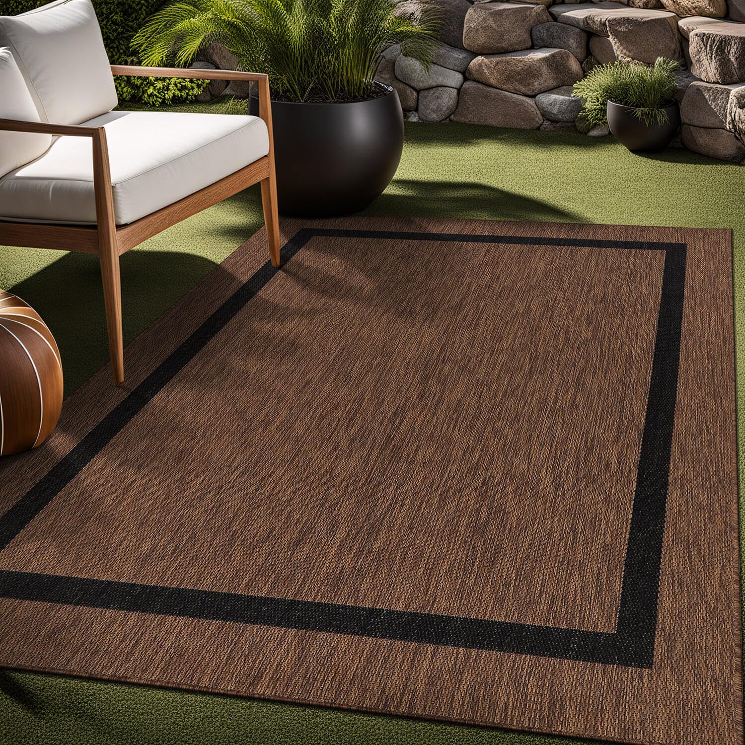 Luul Home bordered outdoor rug 8x10 easy-clean surface cleans with damp cloth or hose.